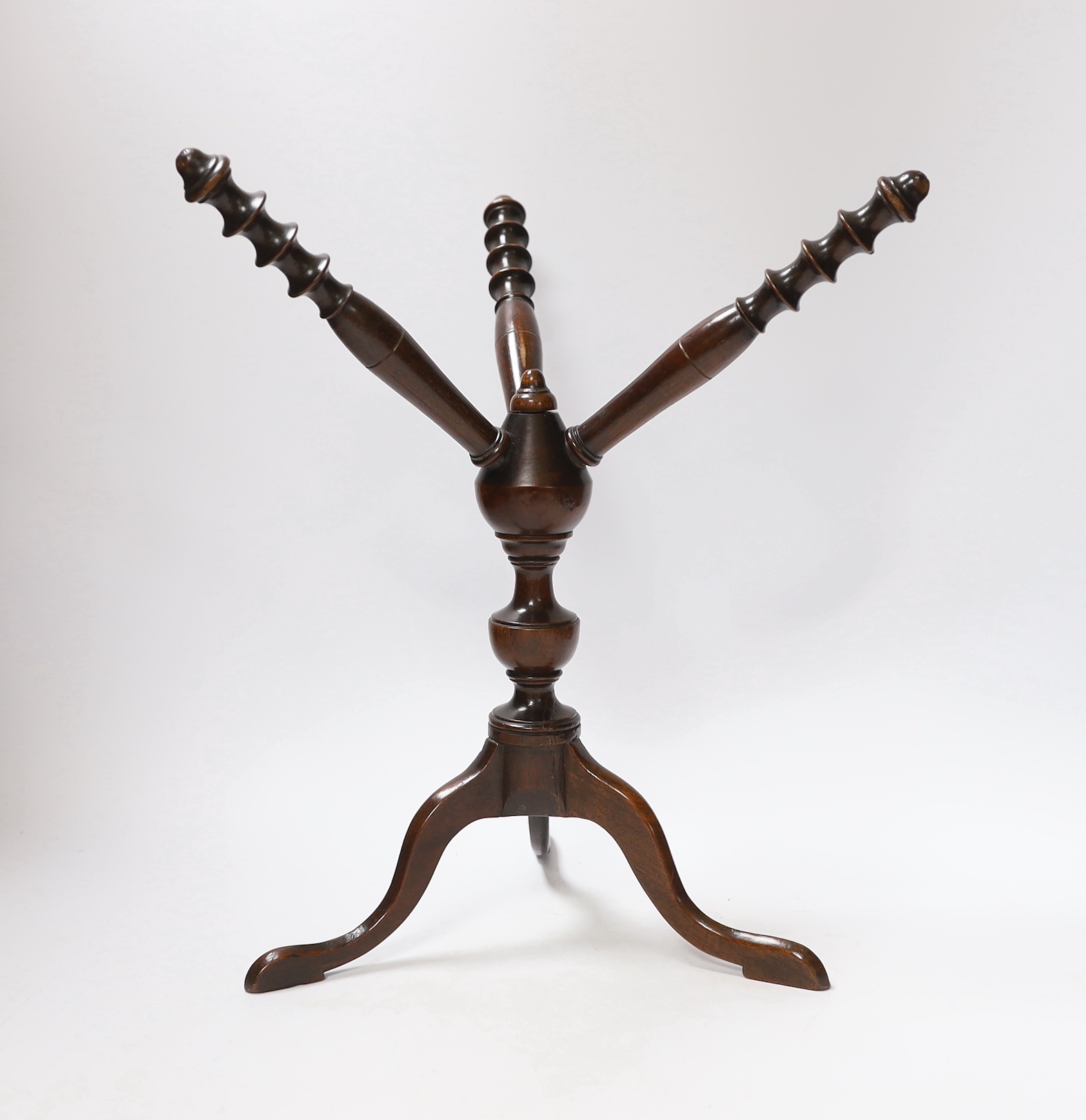 A George III turned mahogany ‘cat’ stand, 34cm